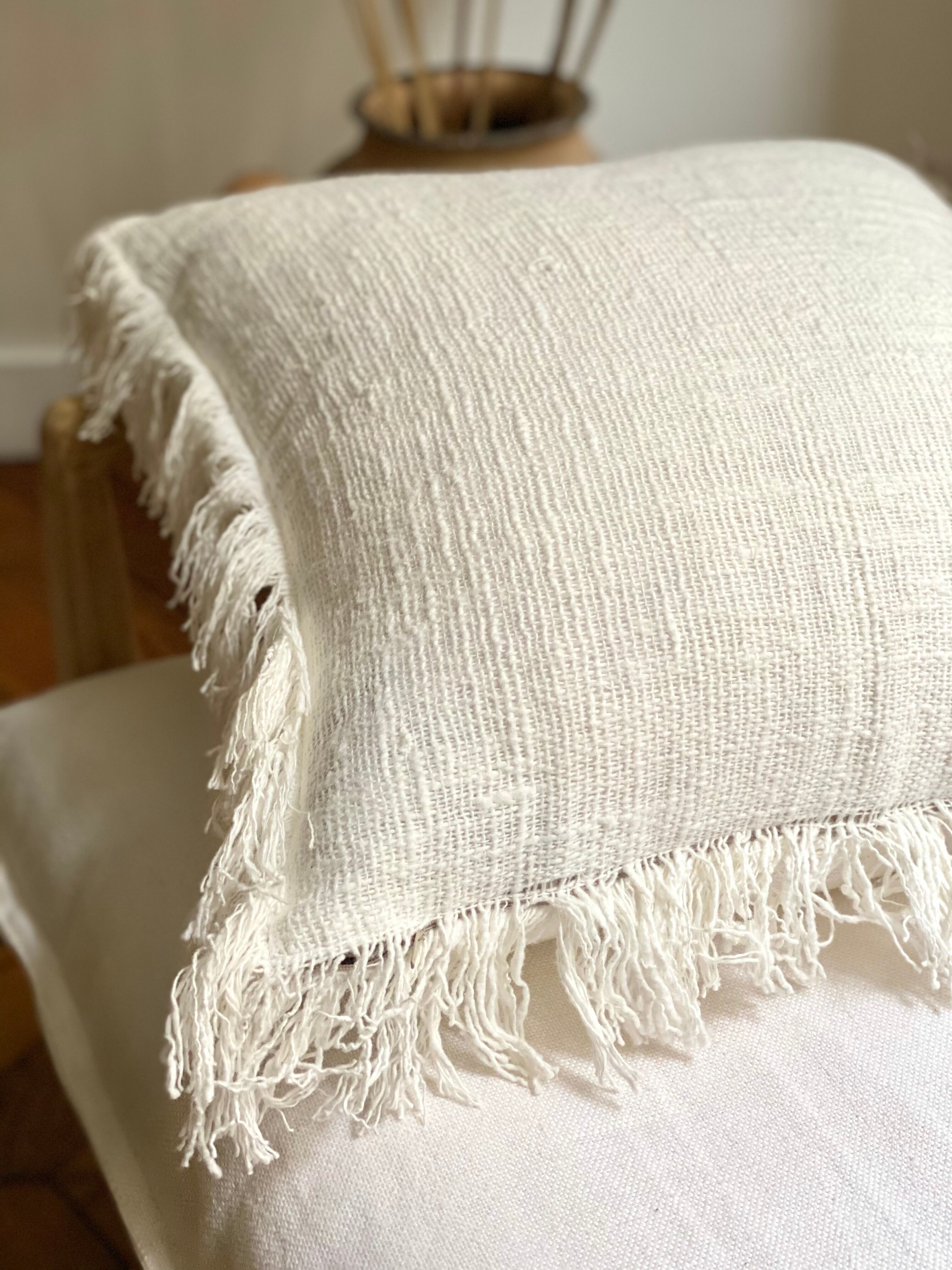 White linen bohemian cushion fringed