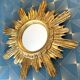 Miroir soleil bois doré,1960