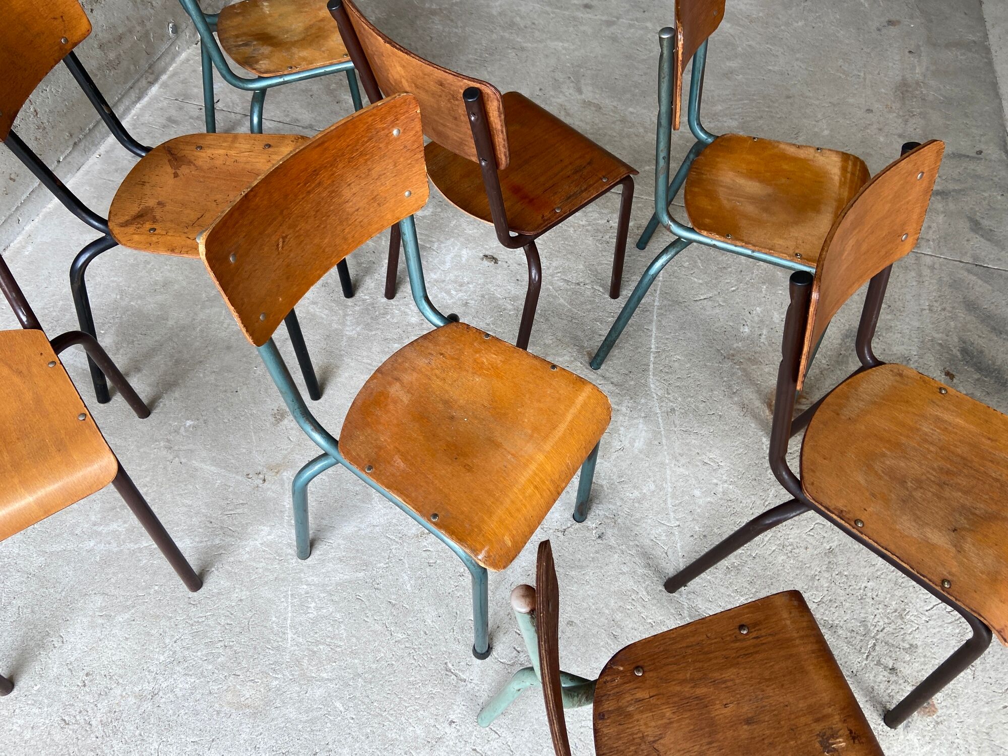 Set of 10 vintage mismatched industrial chairs mullca