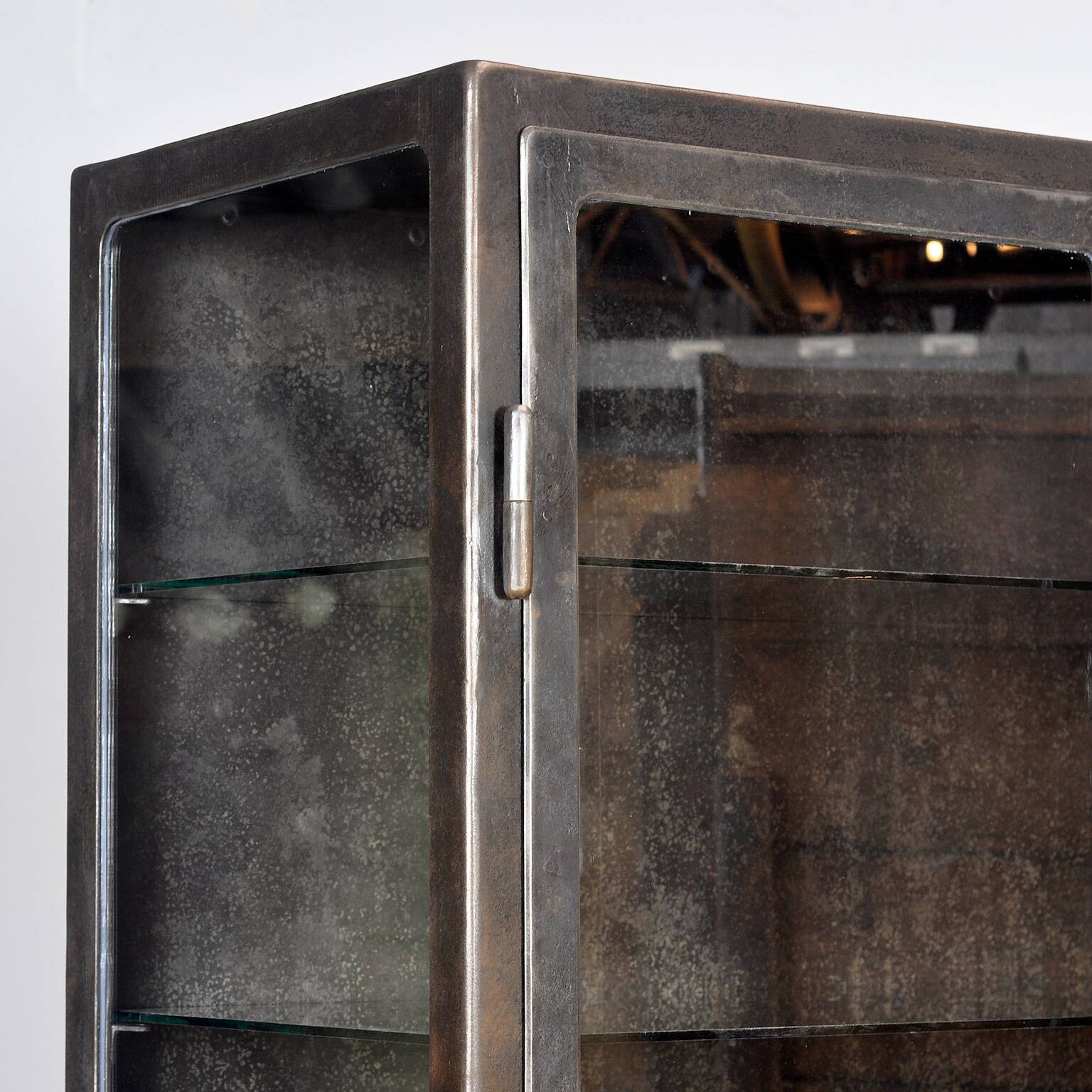 Polished iron medical cabinet, 1930s