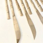 12 gold table knives, Hollywood Regency – circa 1970