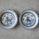 Pair of antique Chinese decorative plates with dragon motif.