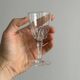 5 clear crystal liqueur glasses.