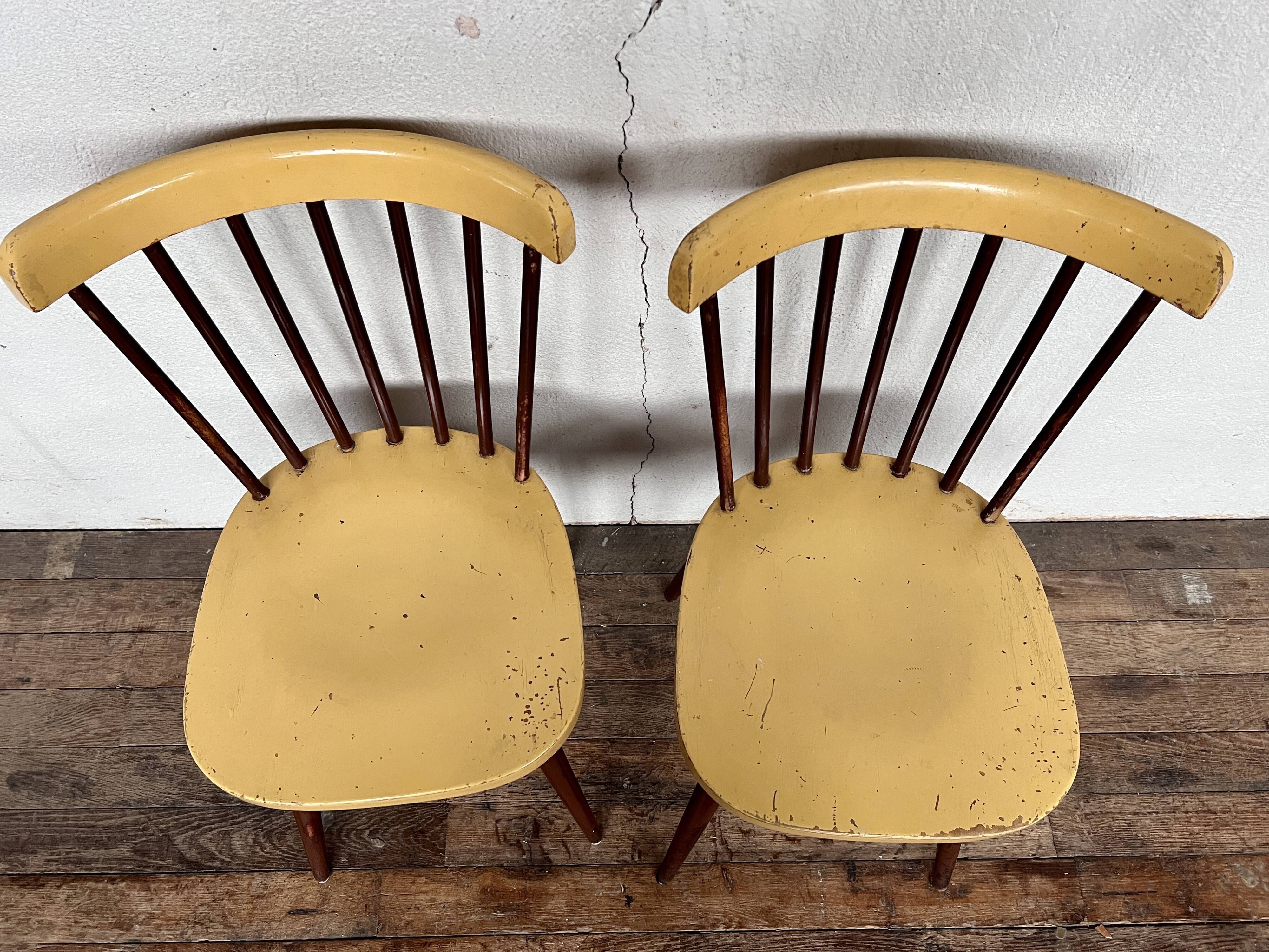 Pair of Baumann bistrot troquet chairs in yellow and brown wood