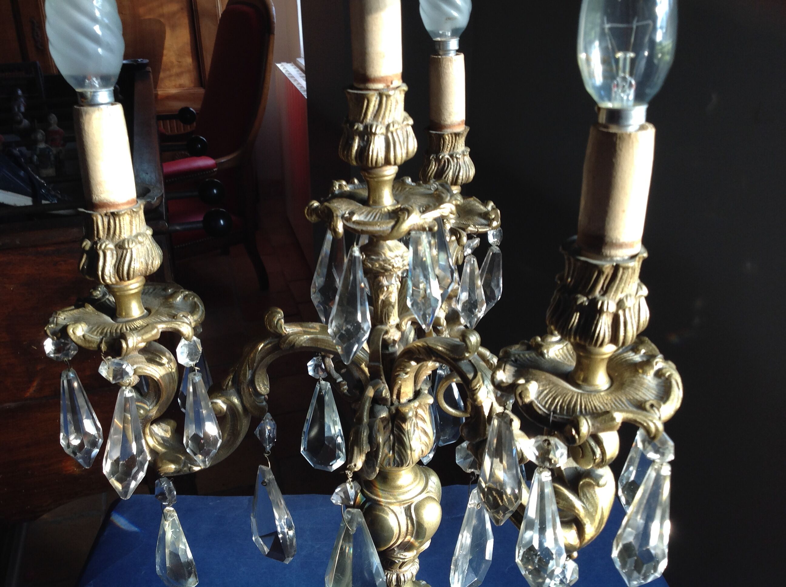 Girandolle in bronze and stamps, early 20th