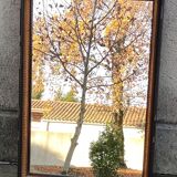 Antique mirror/black and gold frame