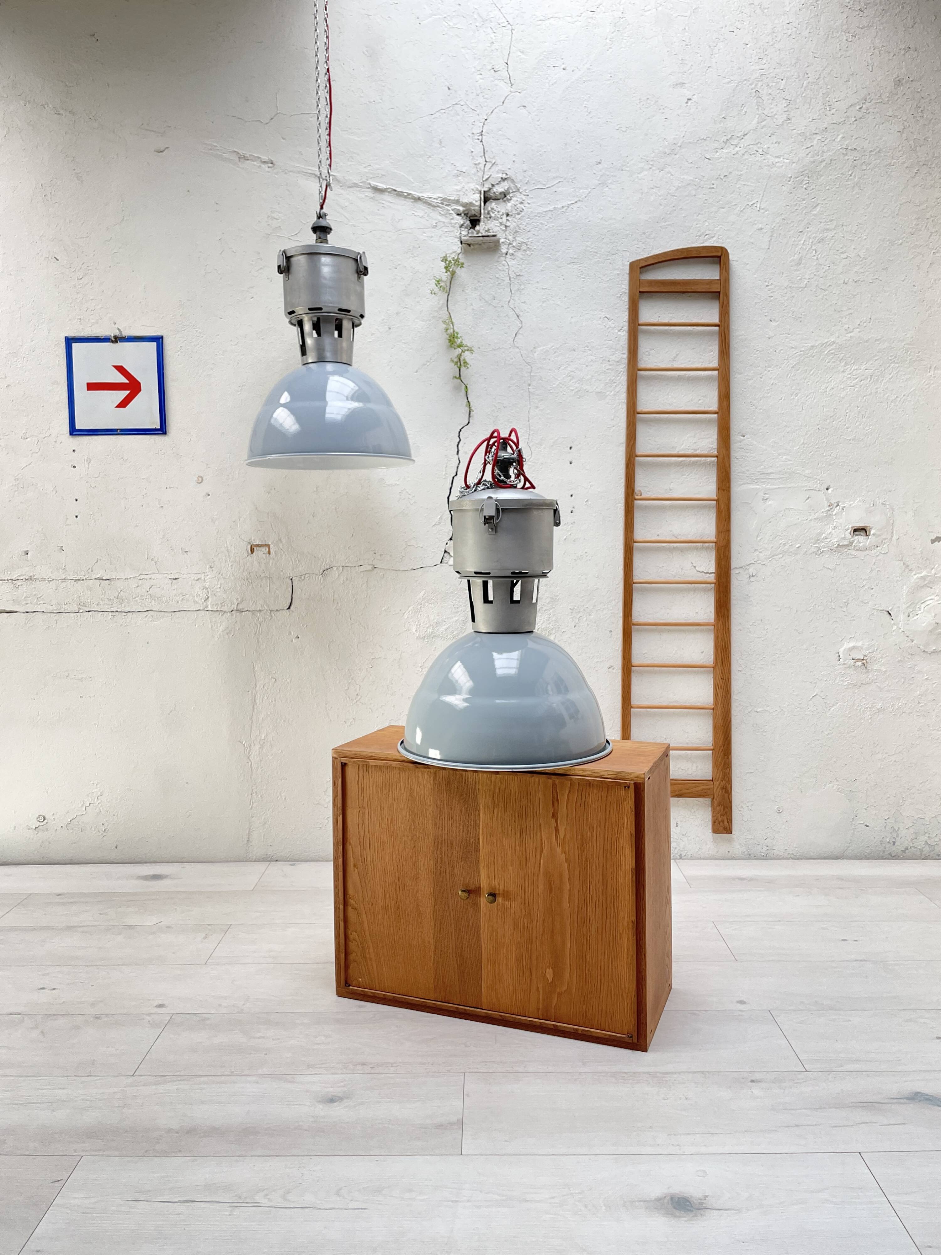 Pair of industrial lamps.