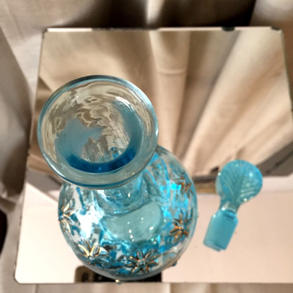 Turquoise blue liquor decanter and glass gild mold press of the 1950s