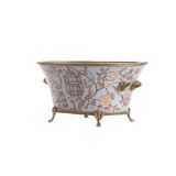 Oval porcelain and bronze peacock cup