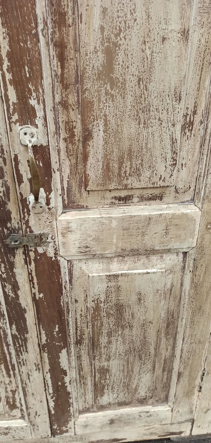 Old wooden wardrobe beige / pale yellow façade