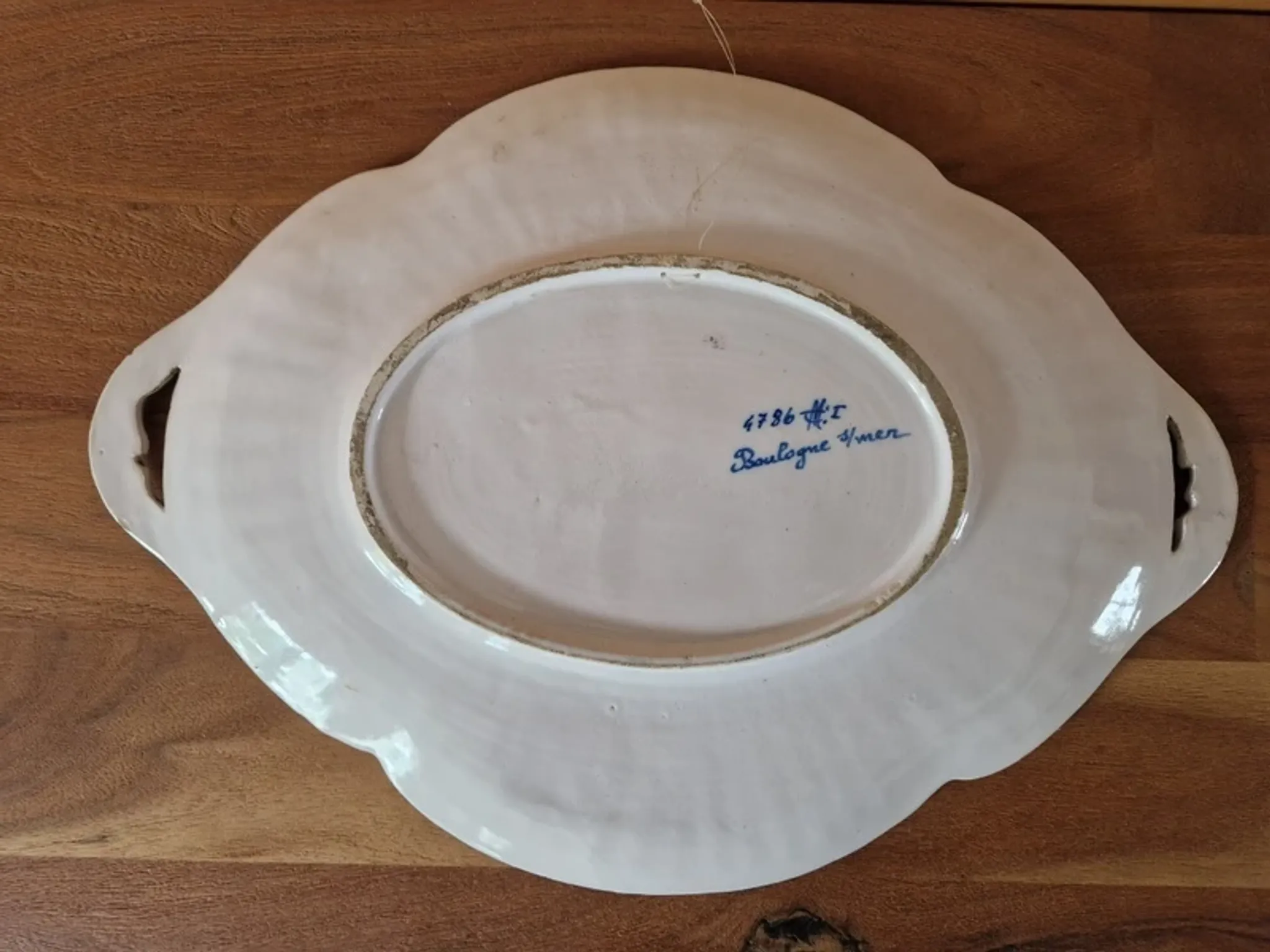 Important oval dish in faience from Boulogne-sur-Mer - Géo Martel