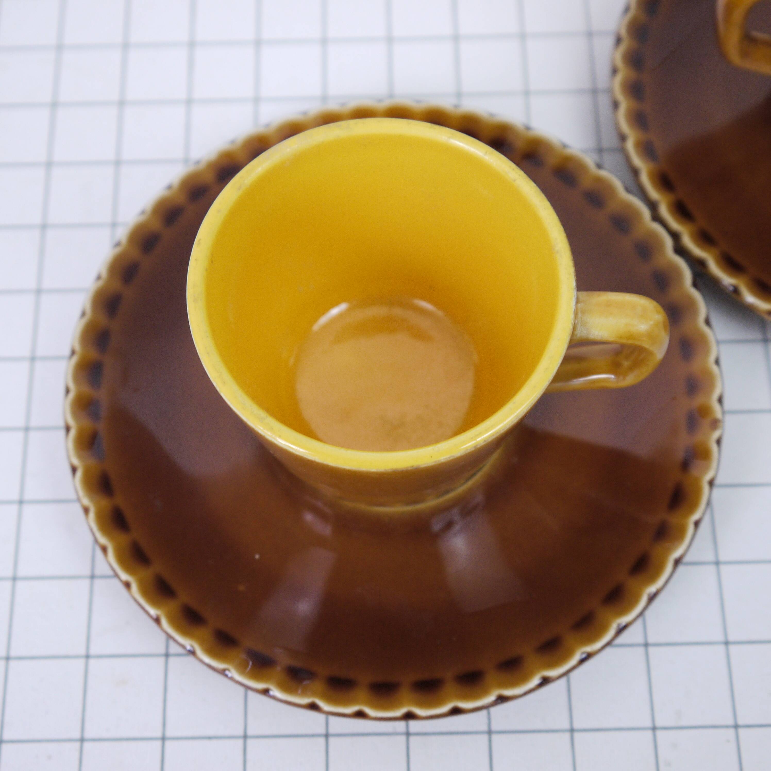 Two Digoin cups and saucers