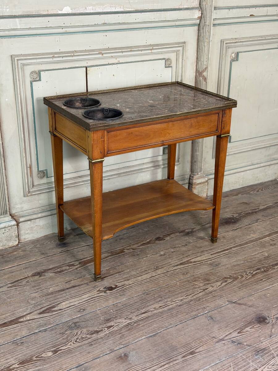Louis XVI refreshment table in mahogany, brass and marble, 18th century.