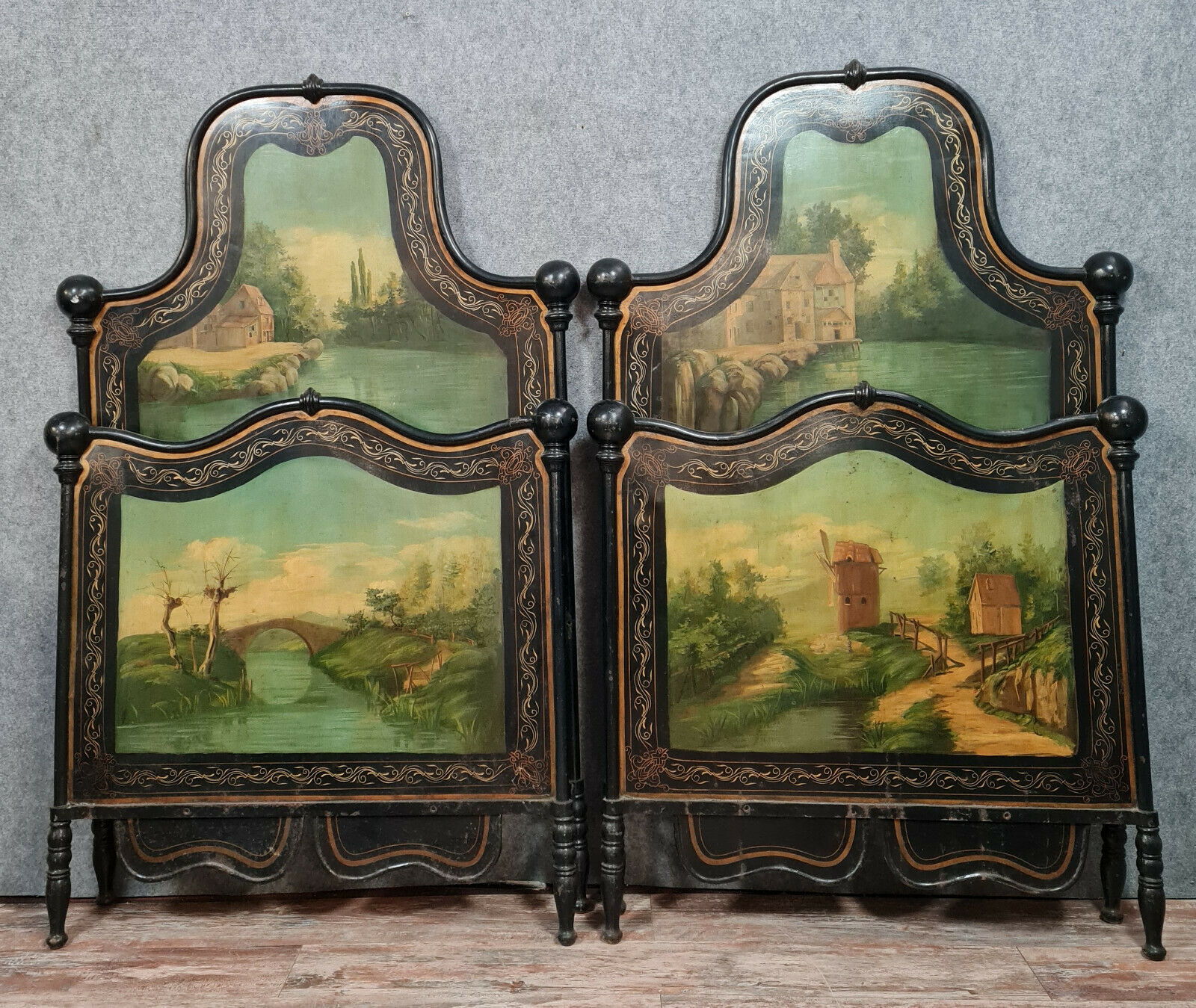 Pair of cast iron beds with hand-painted decorations period