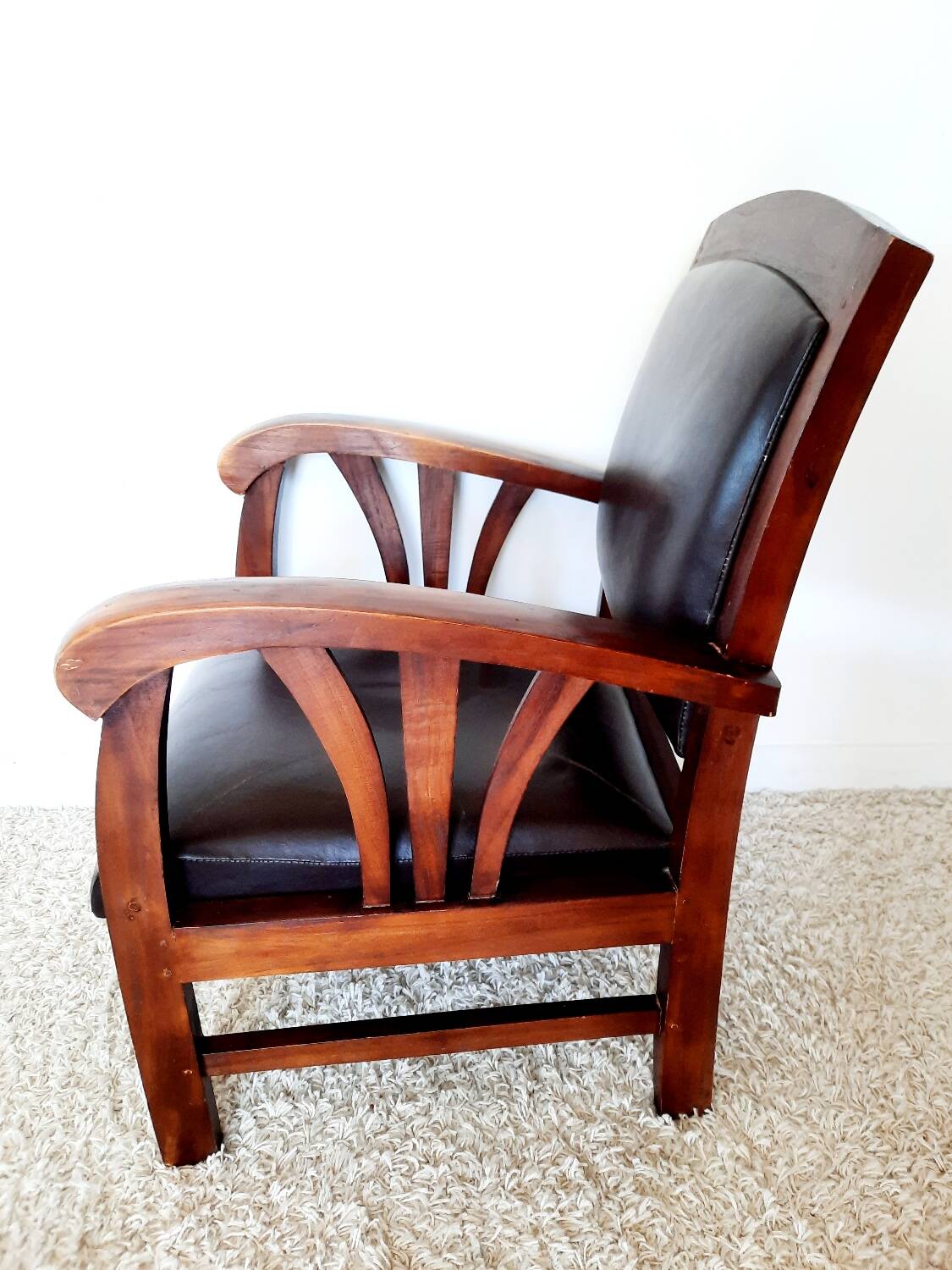 Colonial style wooden armchair