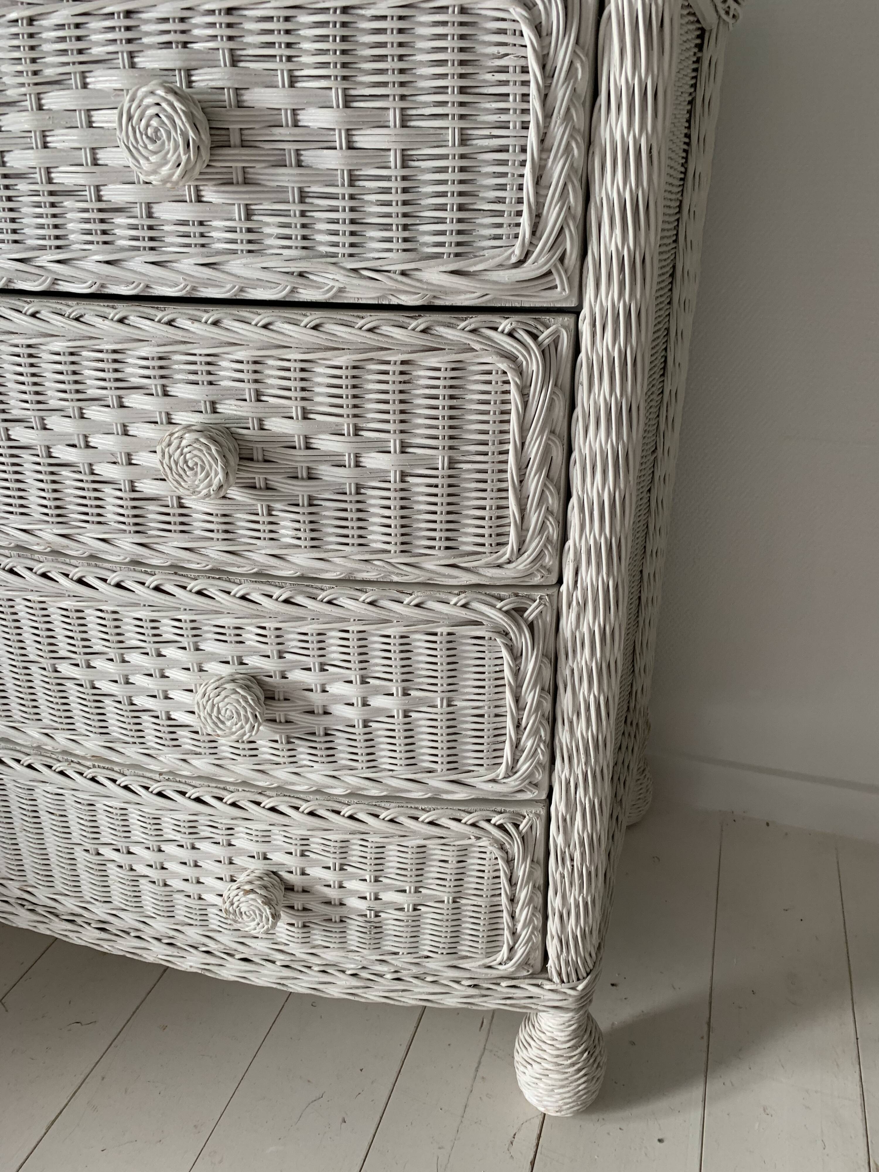 White dresser in vintage rattan