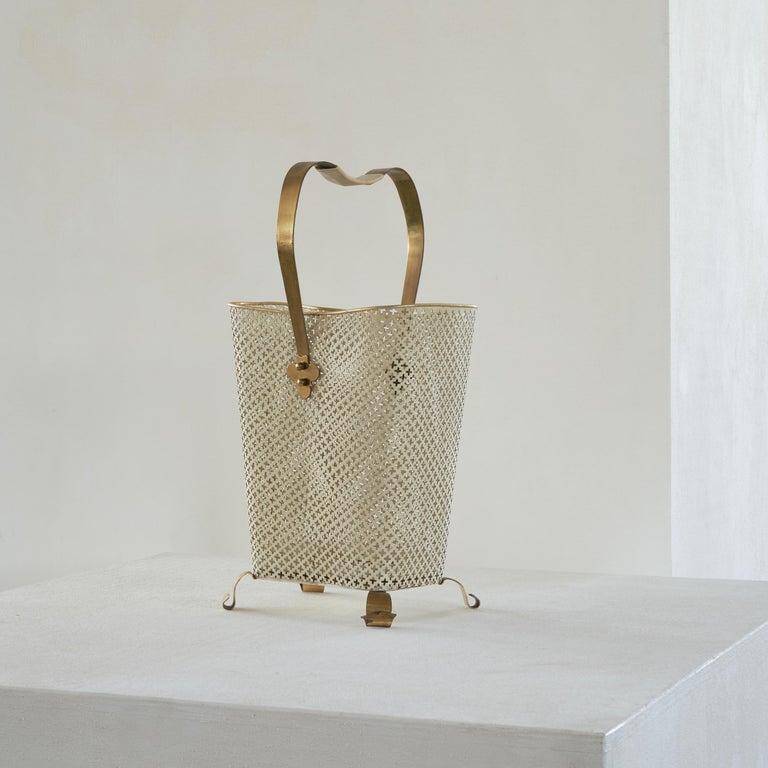 Mid-century umbrella stand in patinated brass and perforated metal, 1950s.