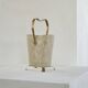 Mid-century umbrella stand in patinated brass and perforated metal, 1950s.