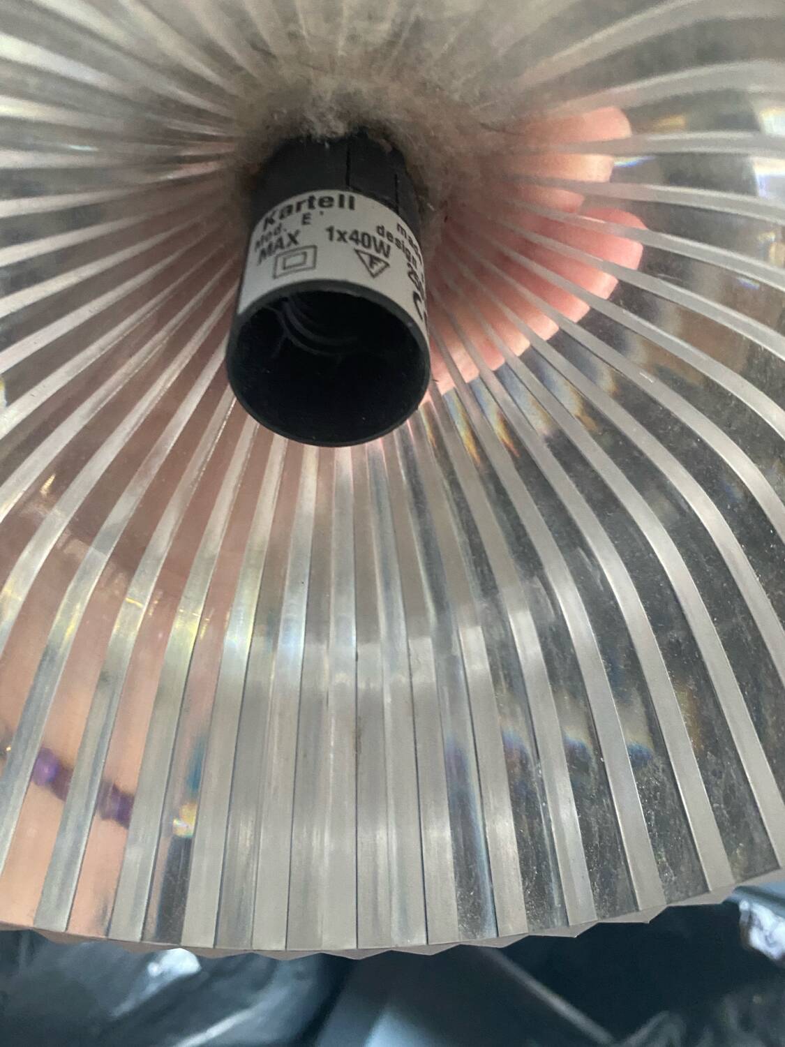 Many Kartell wall lamps.