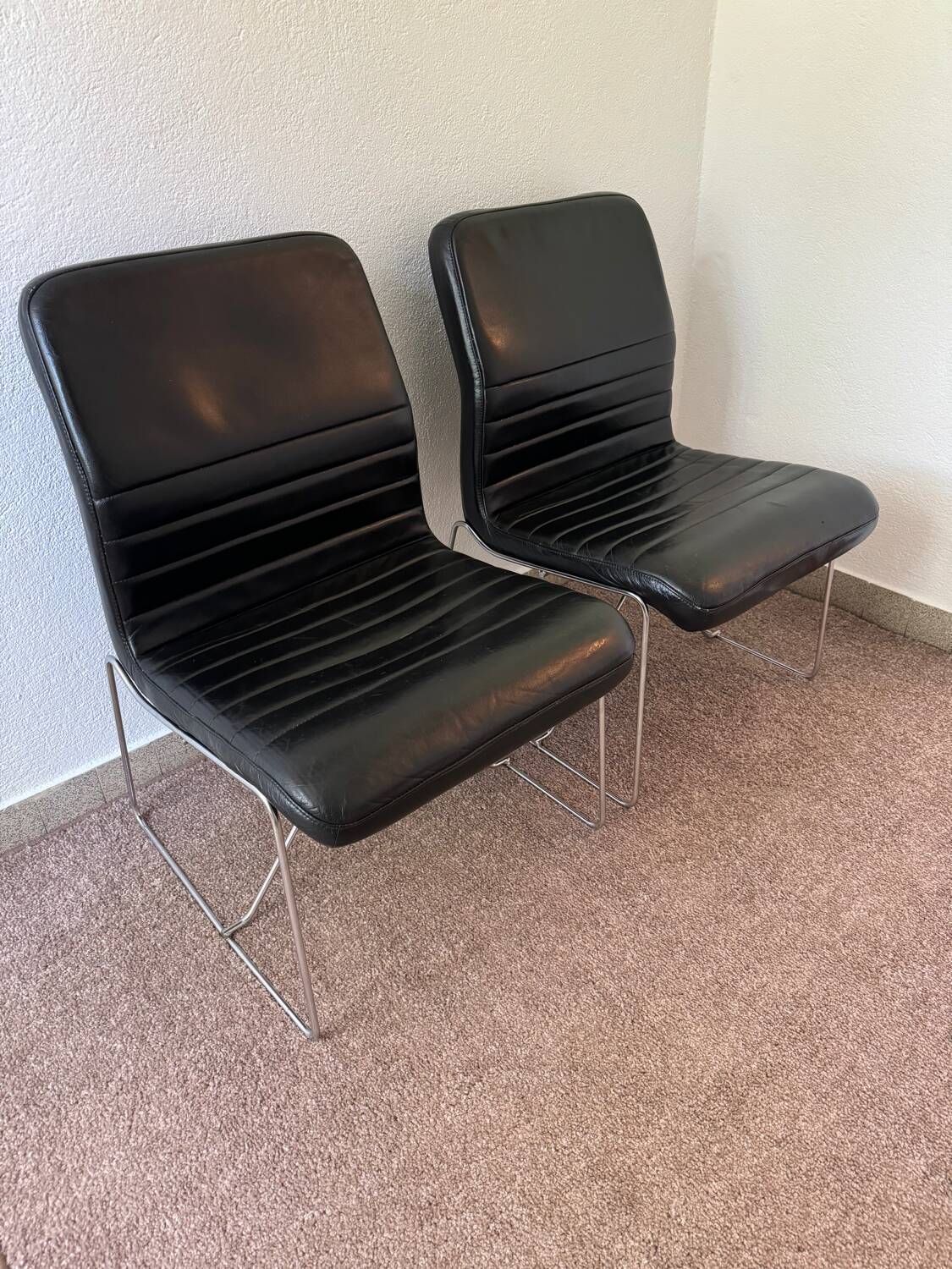 Black leather armchairs, Italian design, 70s (X2)