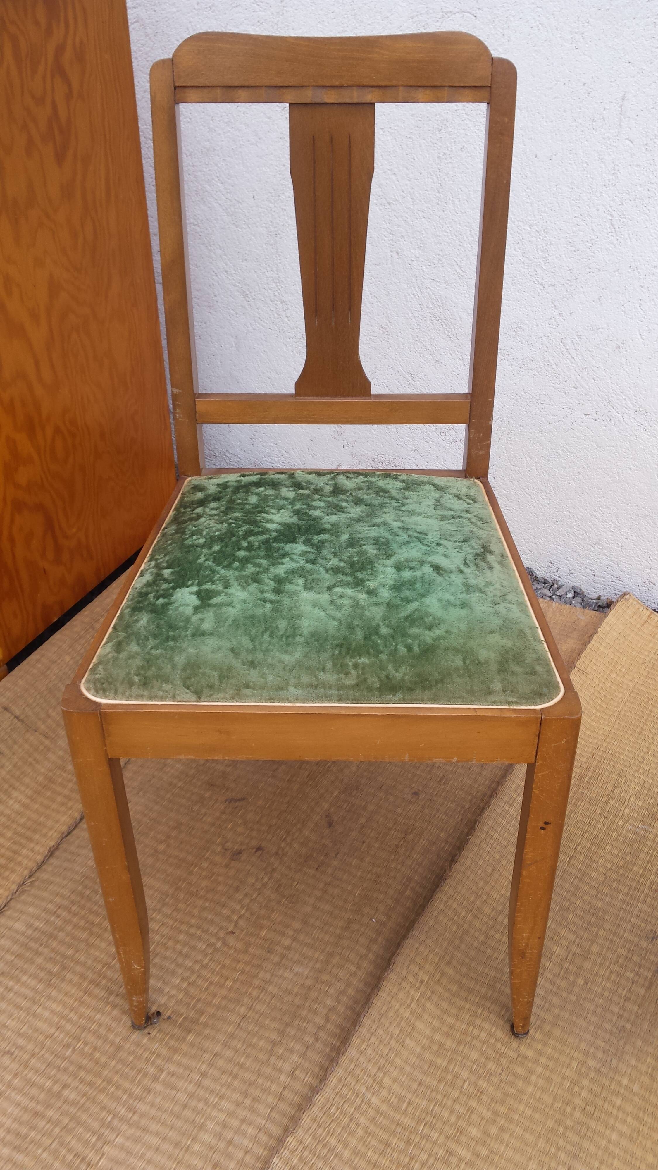 lot of 2 wooden chairs and green velvet