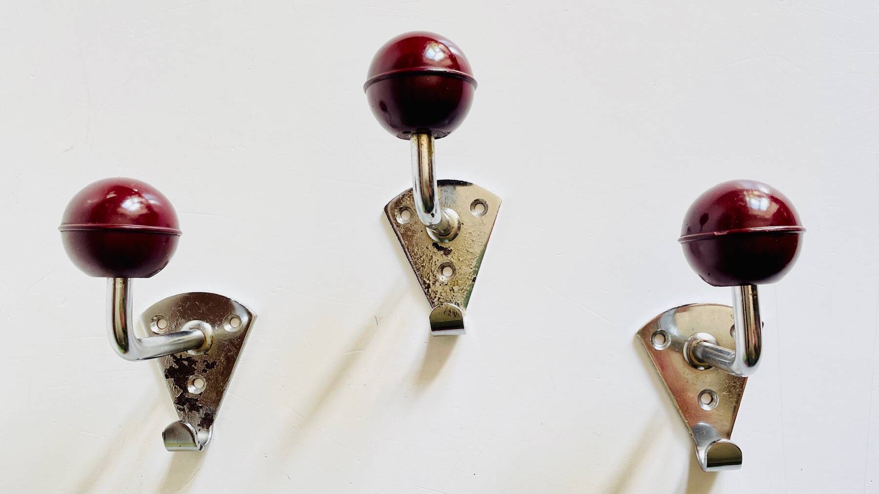 Chrome and bakelite coat hooks from the 70s