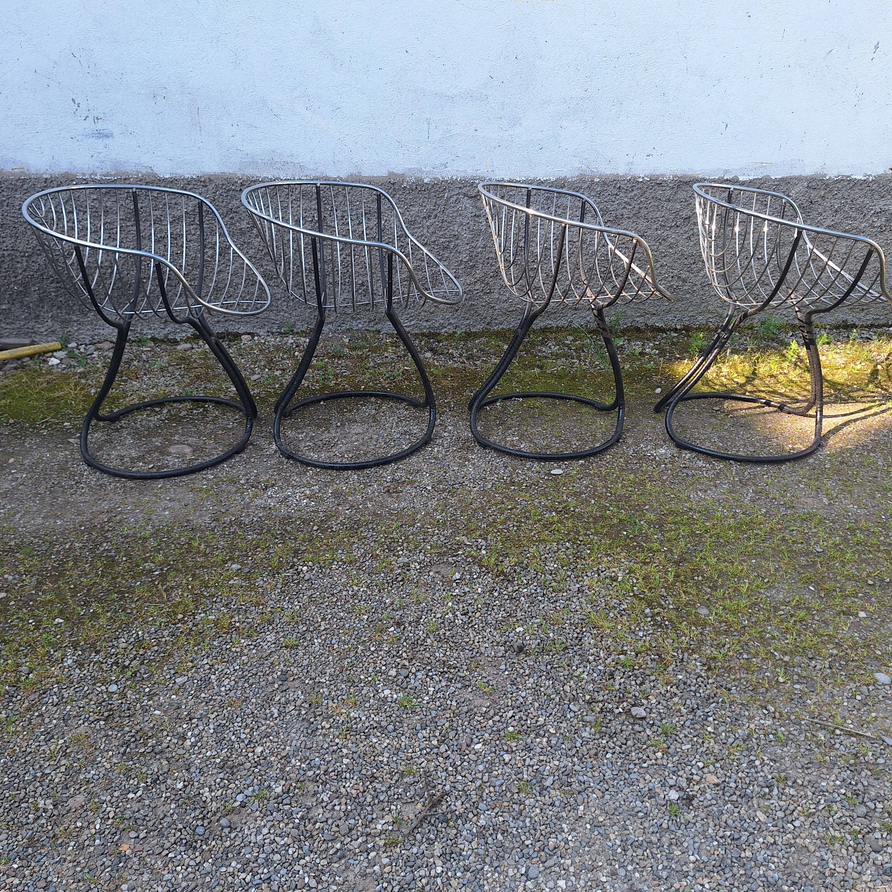 Series of 4 "Pan Am" armchairs