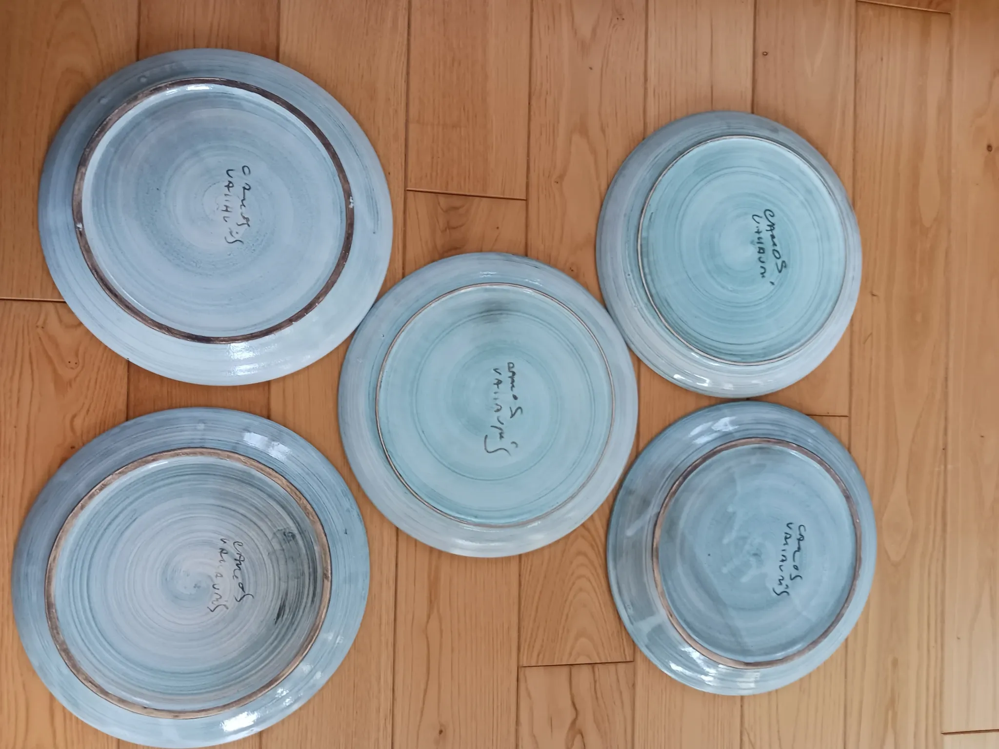 Glazed ceramic plates, signed Camos Vallauris.
