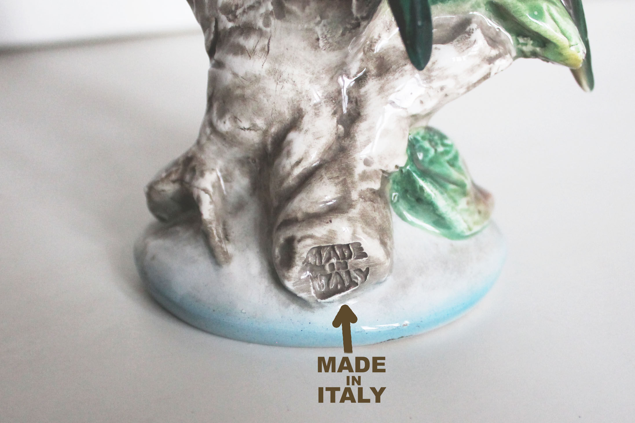 Couple of ceramic parakeets