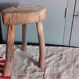 Old small country stool in raw wood - tripod base