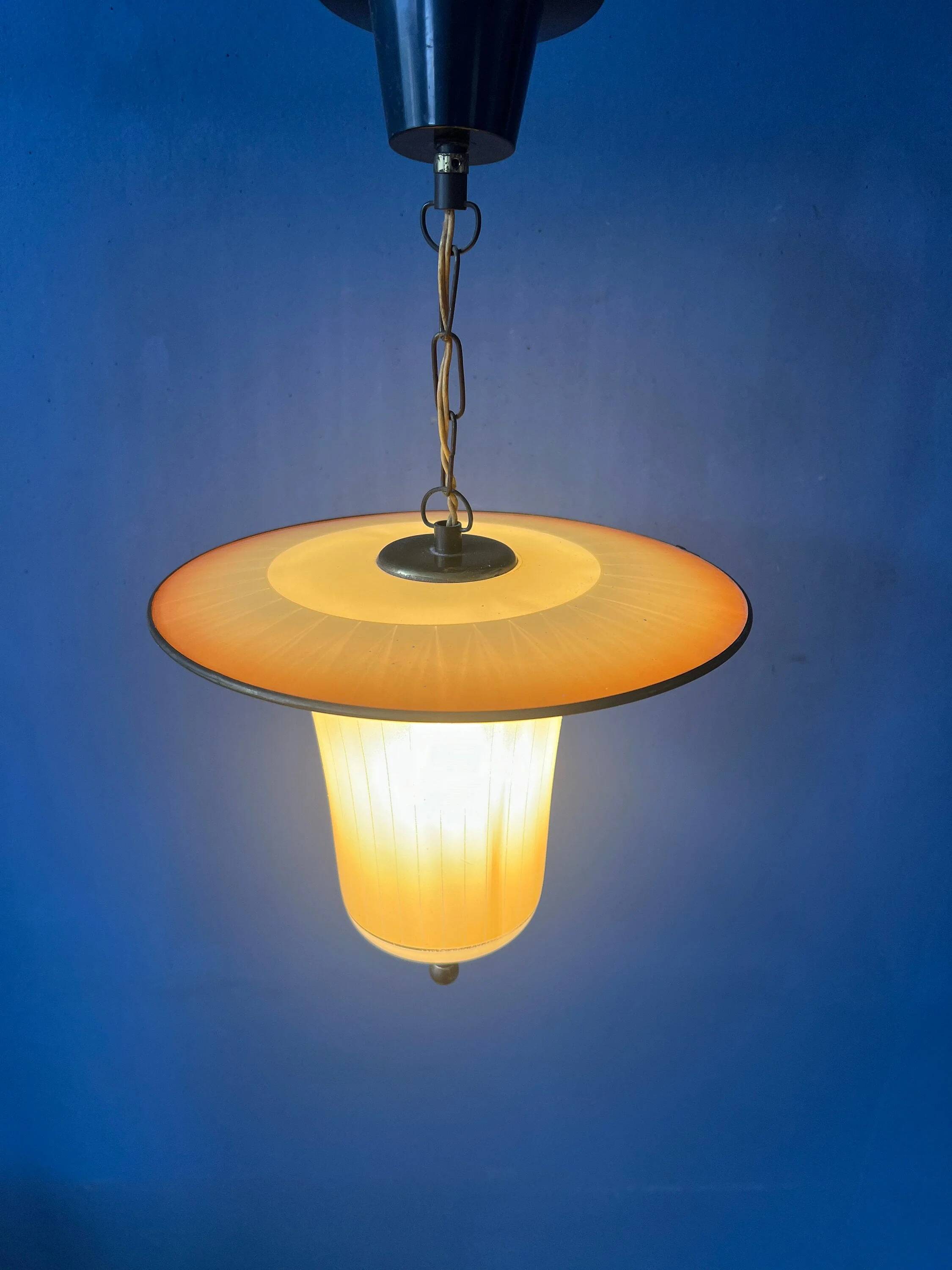 Vintage 1950s glass and brass pendant light.