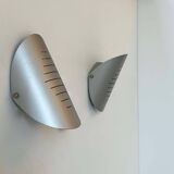 Pair of vintage adjustable wall lights, curved striated metal, France 1980