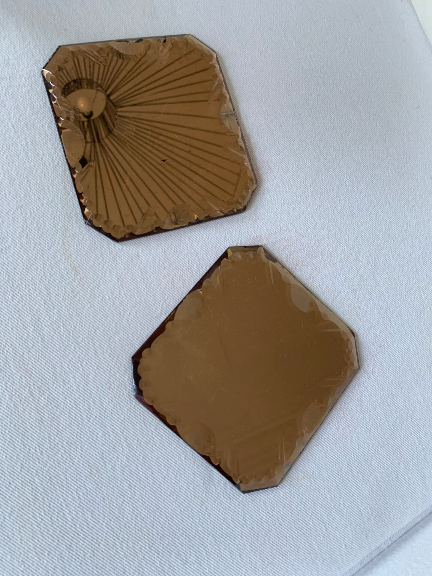 Set of two vintage bevelled mirrors