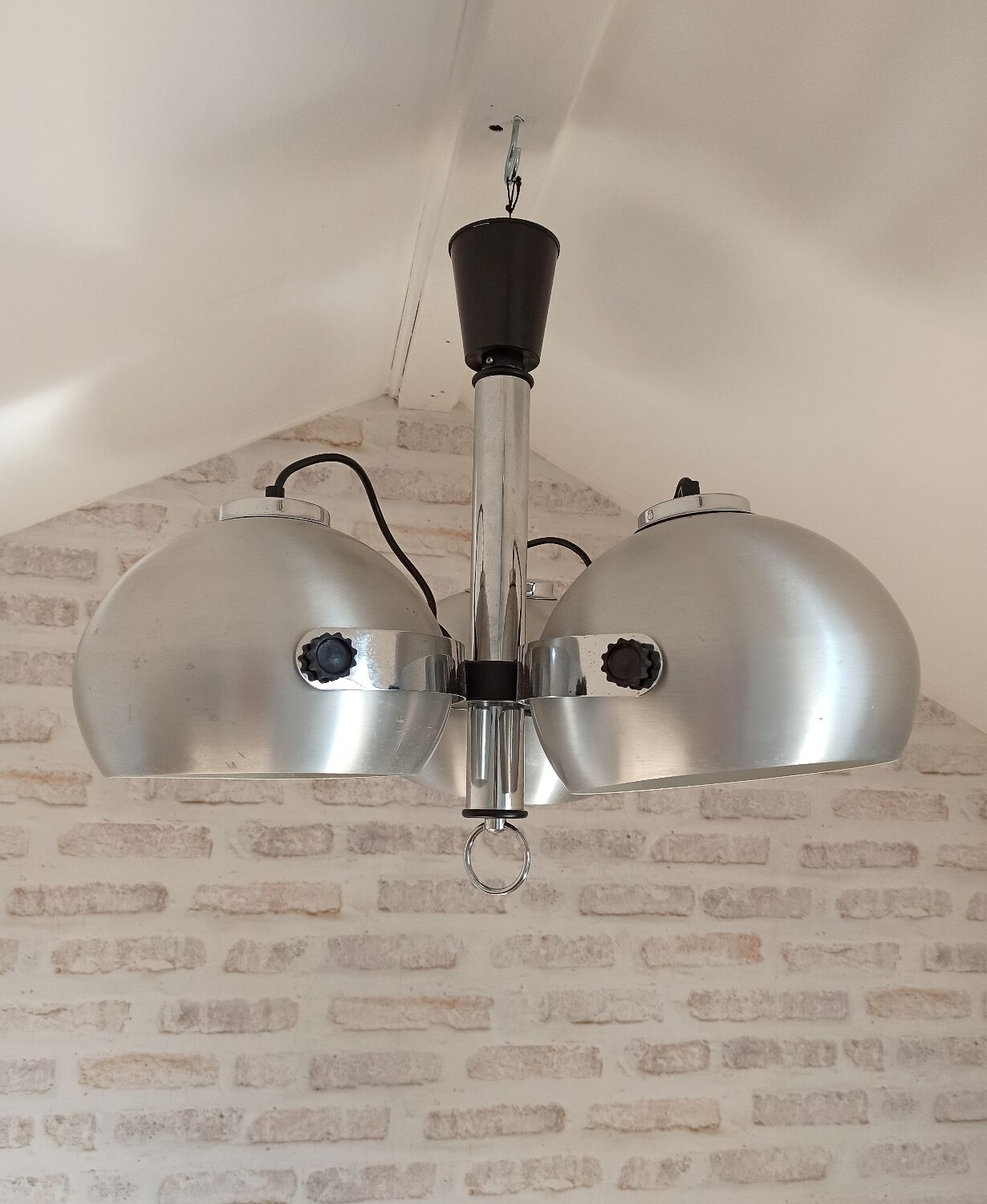 Brushed metal eye ball suspension