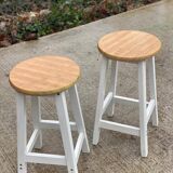 Pair of white and wood effect round stools