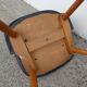 2 chairs in black skai compass legs Louis Paolozzi