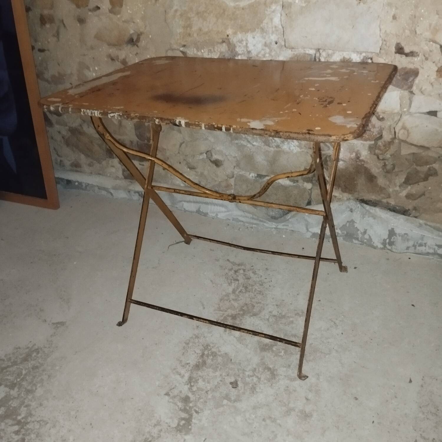 Folding wrought iron garden bistro table