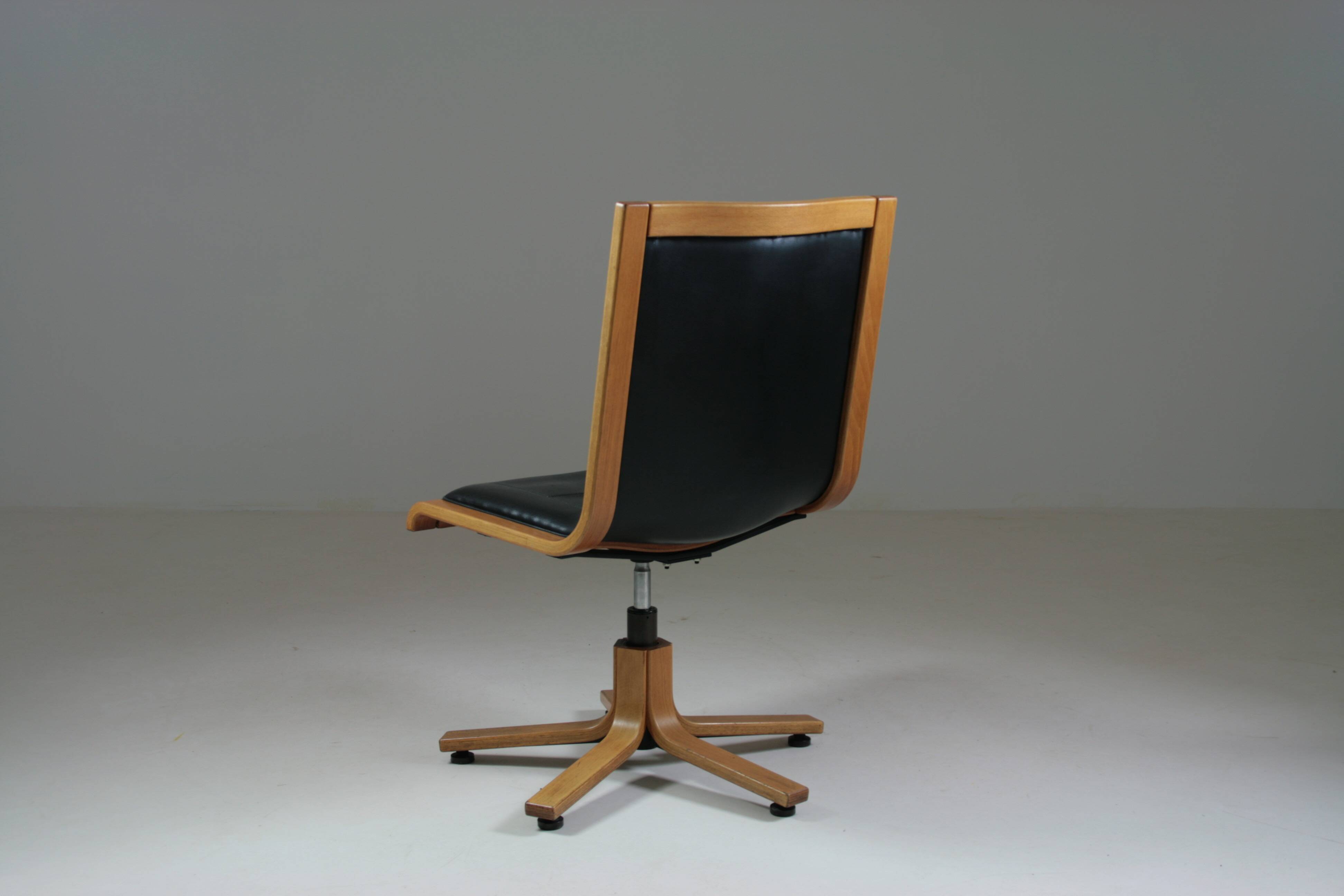Office armchair in beech and black leather for Cofemo, Italy
