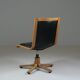 Office armchair in beech and black leather for Cofemo, Italy
