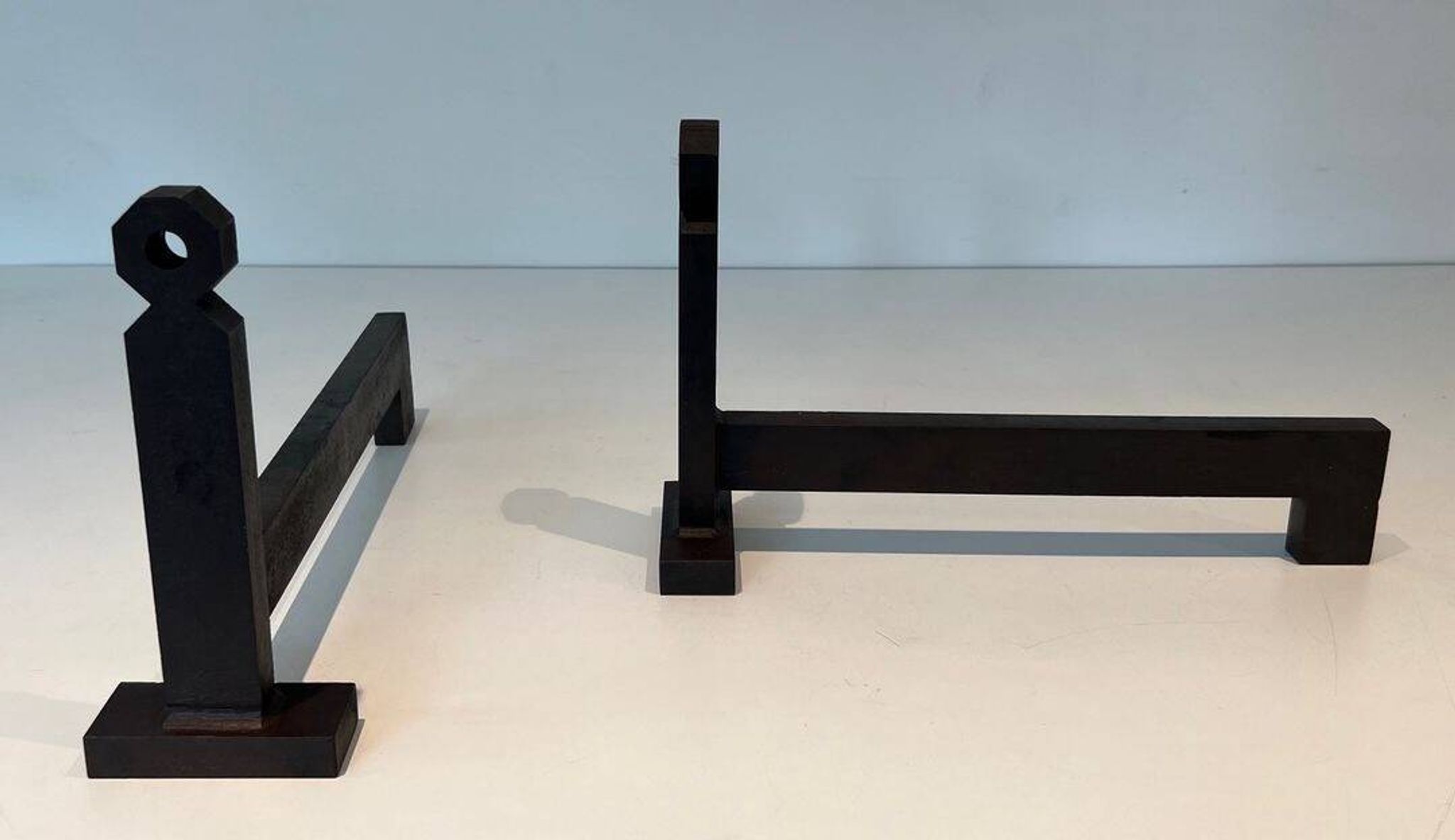 Pair of Minimalist Modernist Wrought Iron Chenets with Torch Holders in Nut Design