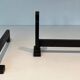 Pair of Minimalist Modernist Wrought Iron Chenets with Torch Holders in Nut Design