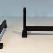 Pair of Minimalist Modernist Wrought Iron Chenets with Torch Holders in Nut Design