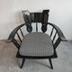 Pair of antique hand-carved armchairs in black lacquer from the 1920s.