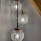 Suspension cascade three lights vintage globes in molded glass
