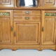 Art Nouveau oak buffet and dinanderie panels, circa 1910