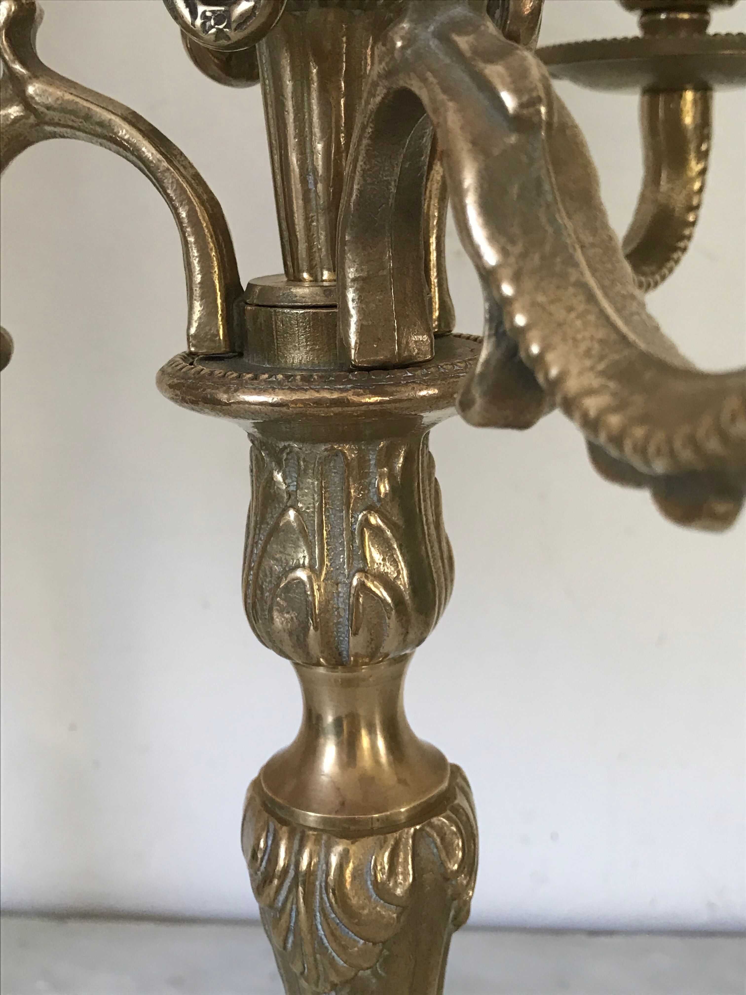 Pair of golden bronze candlesticks