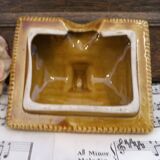 Devonway jam pot in the shape of a cottage with a thatched roof.