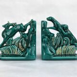 Pair of ART DECO bookends • Glazed earthenware enhanced with touches of fine gold • Circa 1930