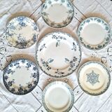 Assiettes à dessert anciennes en terre de ferré accompagnées d'un plat