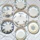 Antique earthenware dessert plates accompanied by a dish
